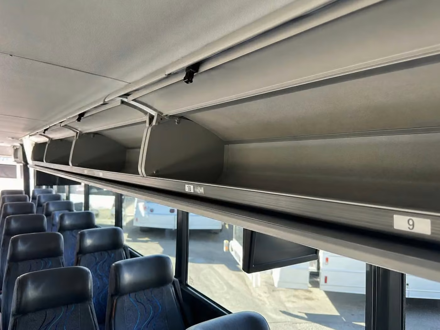 goshen 56 passenger charter bus overhead storage