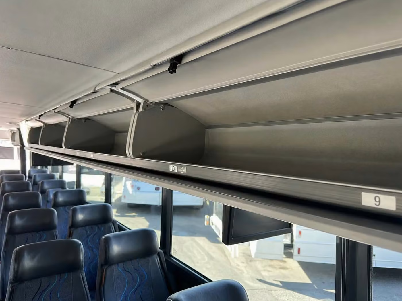 goshen charter bus overhead storage